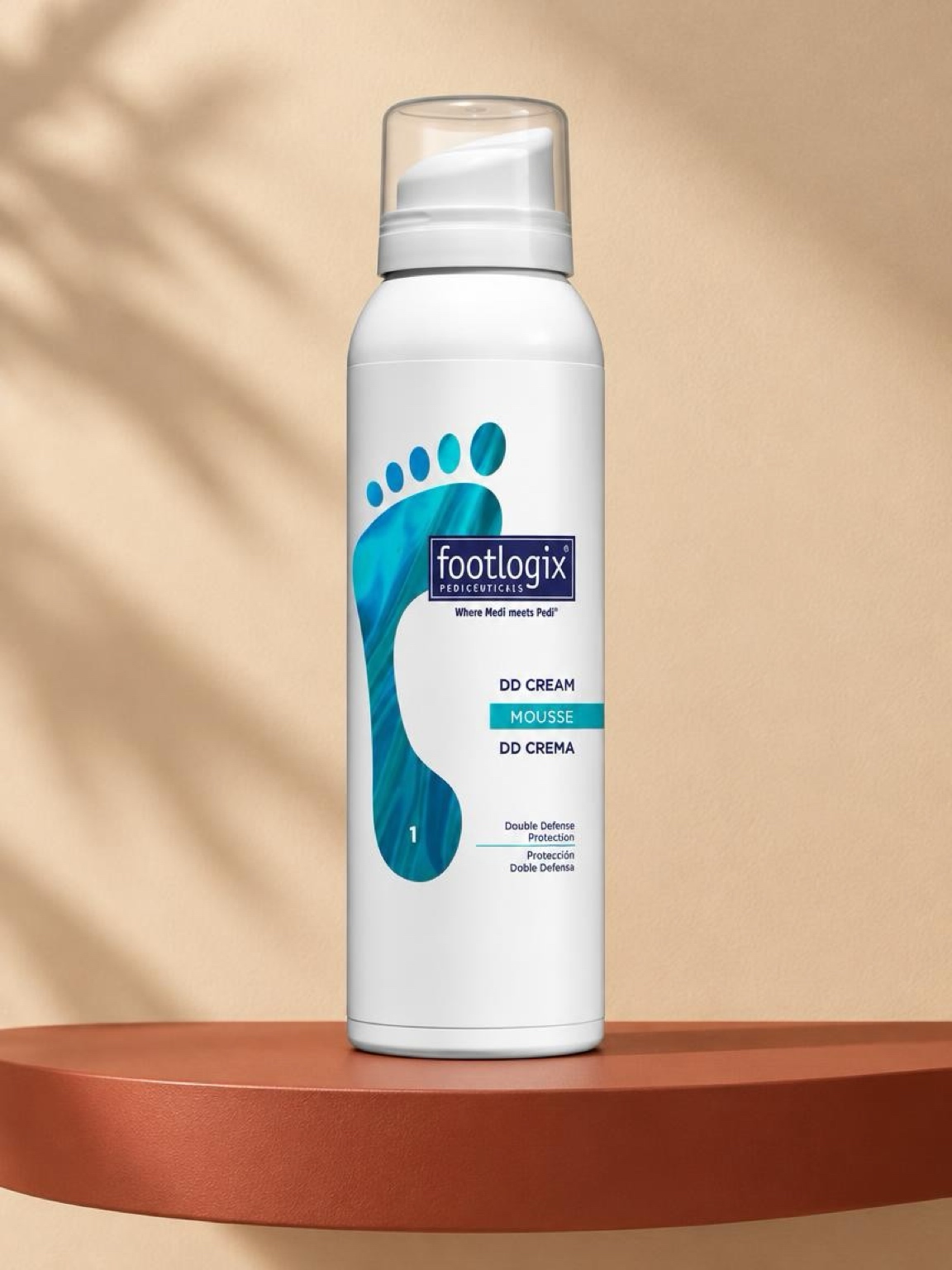 Footlogix DD Cream Mousse on a terracotta pedestal